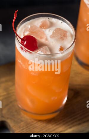 Boozy Refreshing Rum Punch with Lime and Pineapple Stock Photo