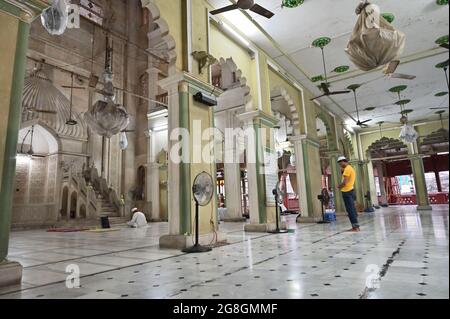 KOLKATA, WEST BENGAL, INDIA - MAY 27 2019 : Young Muslim devotee praying at Nakhoda Masjid, one of the oldest Masjids of Kolkata. Public place of hist Stock Photo
