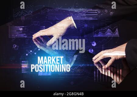 Businessman touching huge screen concept Stock Photo