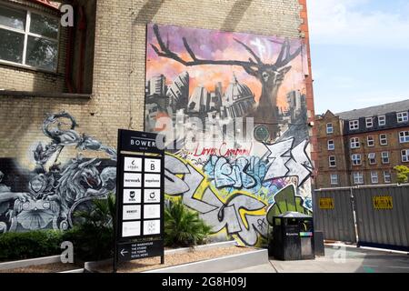 Mural artwork of deer and graffiti on the wall of a building on the corner of Old Street Roundabout and City Road in London E1 England UK  KATHY DEWIT Stock Photo