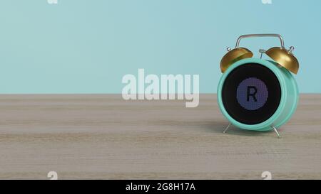 3d rendering of color alarm clock with symbol of letter r in circle on dot display on wooden table with colored wall Stock Photo