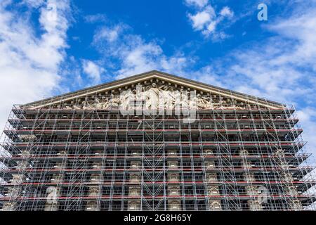 La Madeleine church enveloped in scaffolding for major renovation and cleaning - Paris, France. Stock Photo