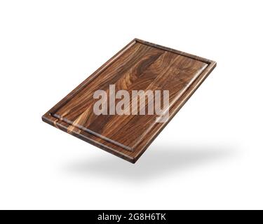 dark wooden cutting board isolated on a white Stock Photo