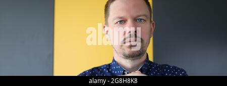 Young man folding his hands and pray Stock Photo