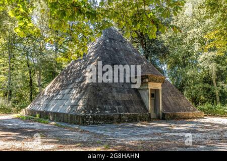 An old pyramid-shape ice house, building used to store ice throughout the year, in the monumental an historical Cascine park, Firenze, Tuscany, Italy Stock Photo