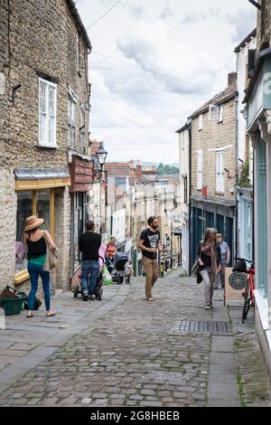 Catherine Hill, a pedestrianised street on a steep hill in the small, English town of Frome, Somerset,UK Stock Photo