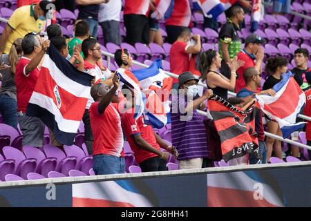 Orlando, United States. 21st July, 2021. Costa Rica fans wave their flags during the CONCACAF Gold Cup game between Costa Rica and Jamaica at Exploria Stadium in Orlando, Florida. NO COMMERCIAL USAGE. Credit: SPP Sport Press Photo. /Alamy Live News Stock Photo