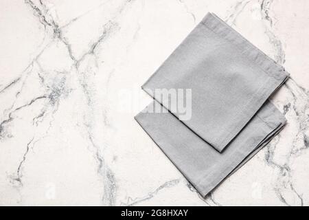 Fabric napkins on light background Stock Photo