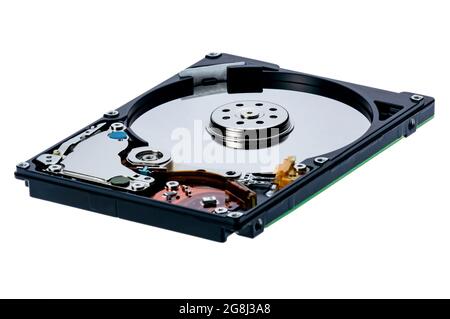 a computer's hard disk hdd data storage drive without shield show magnetic disc and electronic part inside isolated  in white background Stock Photo