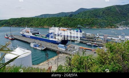 Picton, Marlborough Sounds/New Zealand - February 2, 2020: Inter island Cook Strait ferry terminal with Interislander and Bluebridge ferries. Stock Photo