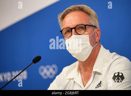 Tokio, Japan. 21st July, 2021. Olympia, kick-off press conference of Team Germany in the press centre of the International Plaza of the Olympic Village. Dirk Schimmelpfennig, Chef de Mission, speaks with mouth-nose protection. Credit: Michael Kappeler/dpa/Alamy Live News Stock Photo