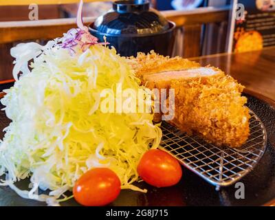 Close up shot of deep fried Pork chop with vegetable salad at Las Vegas, Nevada Stock Photo