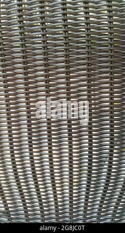 Black synthetic rattan texture weaving background Stock Photo