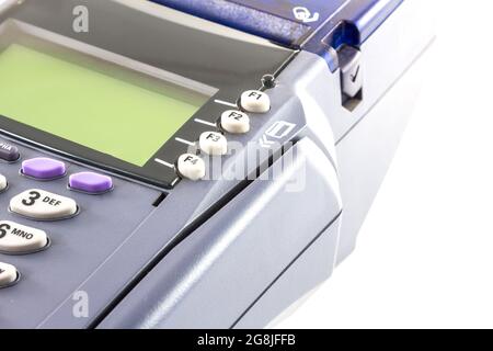 Side view of old credit card reader machine on white background Stock Photo