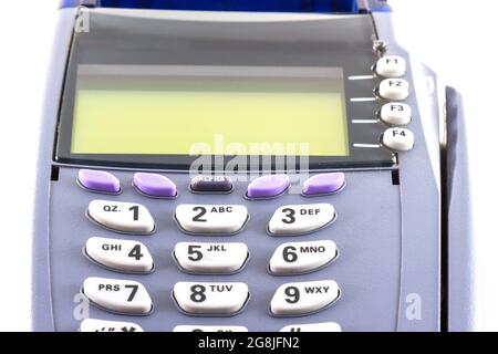 Side view of old credit card reader machine on white background Stock Photo