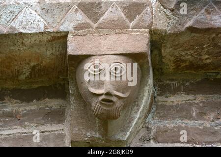 Historical stone carved corbels St Mary and St David Church Kilpeck Herefordshire England UK Stock Photo
