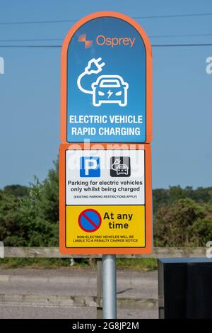 Osprey electric car charging station sign post Stock Photo