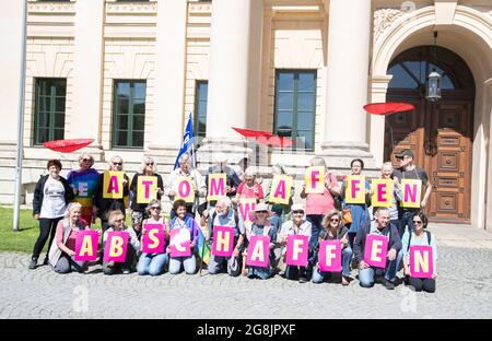 Munich, Germany. 01st June, 2019. Peace activists with sings reading ' abolish nuclear weapons '. In Munich a few hundred people joined a demonstration against nuclear weapons and for the conservation of the Intermediate-Range Nuclear Forces Treaty ( INF Treaty ). (Photo by Alexander Pohl/Sipa USA) Credit: Sipa USA/Alamy Live News Stock Photo