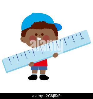 Little boy student holding a big ruler. Stock Photo
