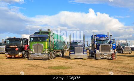 Various makes and models of big rig trucks at a truck show Stock Photo