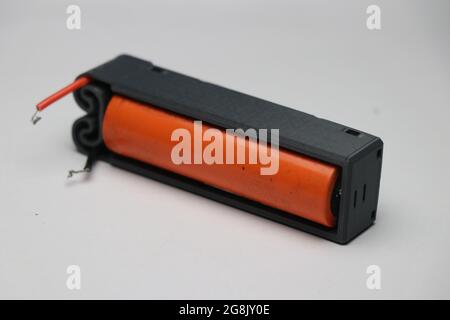 Lithium ion which is rechargeable type of battery connected to its holder Stock Photo