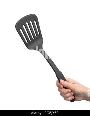 Plastic spatula in woman hand, isolated on a white background Stock Photo