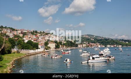 Small boats anchored near Beykoz coastline, Beykoz is a district in Istanbul, Turkey at the northern end of the Bosphorus on the Anatolian side. Stock Photo