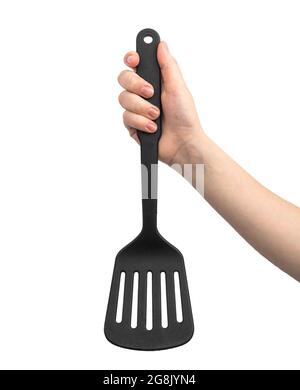 Plastic spatula in hand, isolated on a white background Stock Photo