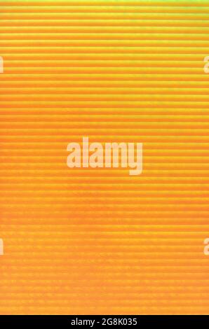 Orange colored abstract background with pattern stripes and gradient. Stock Photo