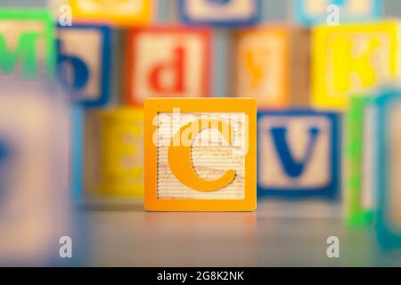 Photograph of colorful Wooden Block Letter C Stock Photo