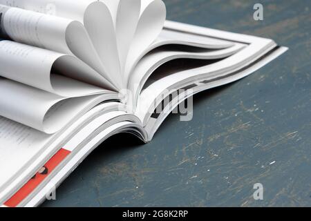 Close up stacking magazine place on table background Stock Photo