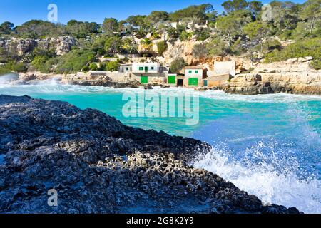 On the rocks of popular Cala Llombards, balearic island of Majorca or Mallorca, in winter. View in direction of Cala Santanyi. Stock Photo