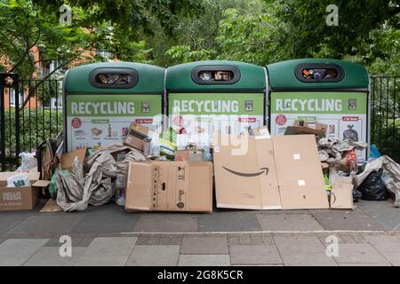 Overflowing recycling bins and Amazon cardboard packaging, Bloomsbury, Camden, London Stock Photo