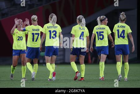 Tokyo, Japan. 21st July, 2021. Swedish players celebrate after winning a Group G Women's Football match against the USA at the Tokyo Summer Olympic Games in Tokyo, Japan, on Wednesday July 21, 2021. Photo by Bob Strong/UPI. Credit: UPI/Alamy Live News Stock Photo