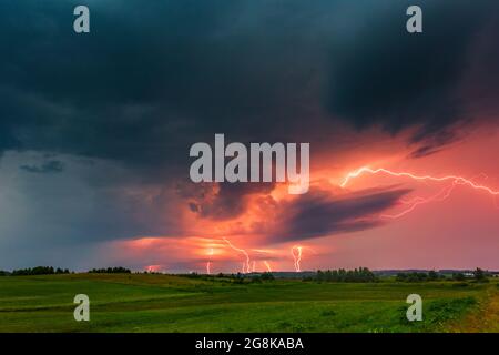 Thunder lightning storm clouds with lot of ligtning bolts Stock Photo ...