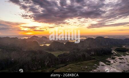 Van Long Natural Reserve in Ninh Binh, Vietnam from aerial view Stock Photo