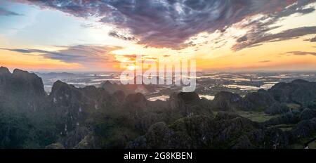 Van Long Natural Reserve in Ninh Binh, Vietnam from aerial view Stock Photo