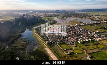 Van Long Natural Reserve in Ninh Binh, Vietnam from aerial view Stock Photo