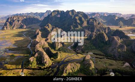 Van Long Natural Reserve in Ninh Binh, Vietnam from aerial view Stock Photo