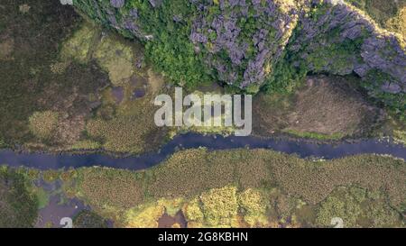 Van Long Natural Reserve in Ninh Binh, Vietnam from aerial view Stock Photo