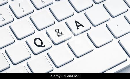 Q&A or question and answer text on modern computer Keyboard Stock Photo
