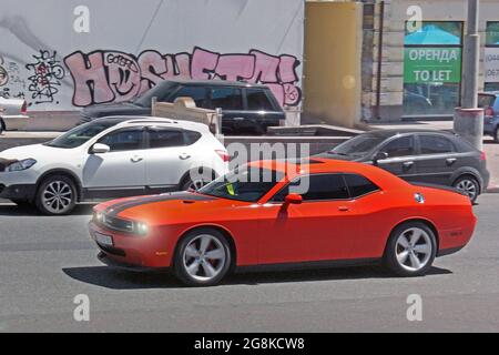 Kiev, Ukraine - June 10, 2017:  American muscle car Dodge Challenger SRT8 in motion Stock Photo