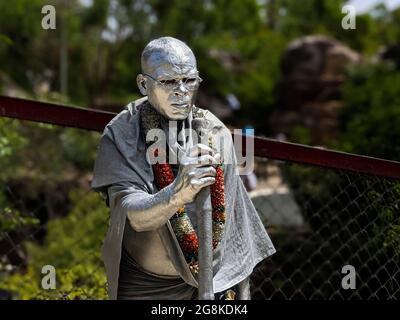close shot of duplicate Mahatma Gandhi street performer in Natural rock garden in Tirumala: Tirumala, Andhra Pradesh, India-July 10.2021 Stock Photo