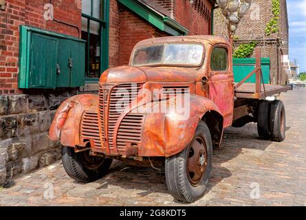 Distillery District old red truck and brick walls. Stock Photo