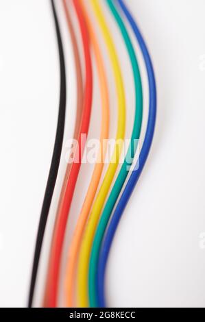 Colorful cables lines isolated on white studio background Stock Photo