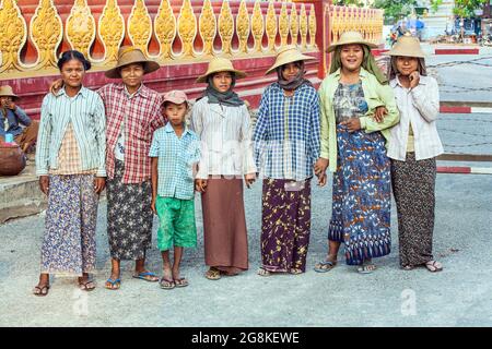 Group photograph of young Burmese child labourer road construction workers posing in the street, Monywa, Myanmar Stock Photo