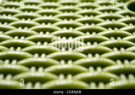Chinese seamless pattern on green color plastic screen. Close up. Abstracts and backgrounds. Repeat vector knitted Design and pattern element Selectiv Stock Photo