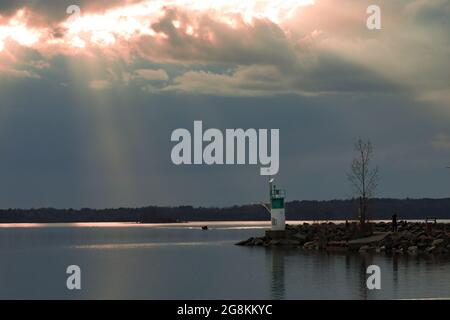 Sunset over a lighthouse in the Ottawa river Stock Photo