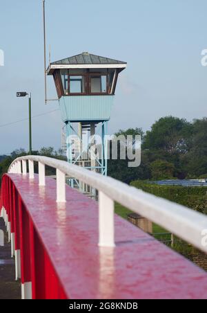 Red foot and bicycle bridge seen in Littlehampton, West Sussex, England, UK. Stock Photo