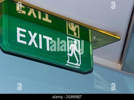 EXIT sign on ceiling Stock Photo